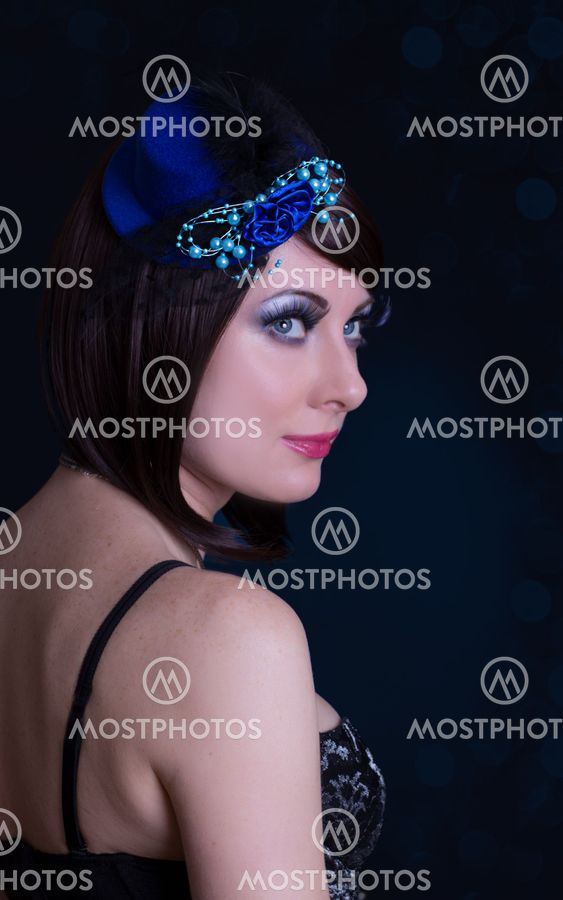 Woman with hat and long lashes