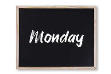Monday word in chalk on chalkboard