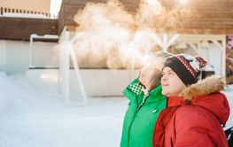 Winter plus size couple lovestory. Happy smiling man,...