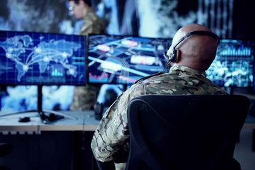 Army Soldier Operates Advanced Computer Technology