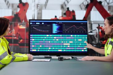 Young female engineer developing automated manufacturing...