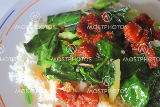 stir fried kale with crispy pork