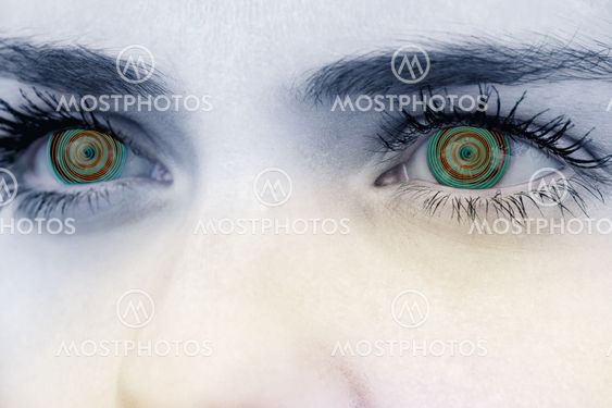 Composite image of close up of female blue eyes