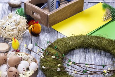Materials for the Easter handmade on a gray wooden...