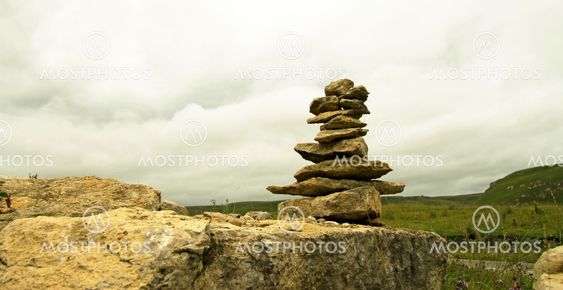 Balanced stones on the alpine meadow near caucasus...