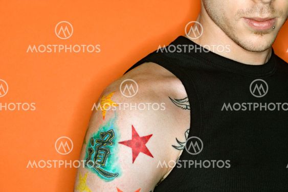Man with tattoos.