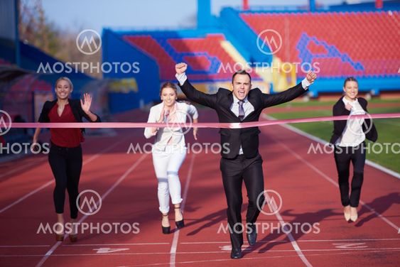 business people running on racing track
