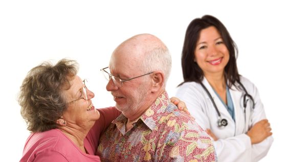 Senior Couple with Medical Doctor or Nurse Behind