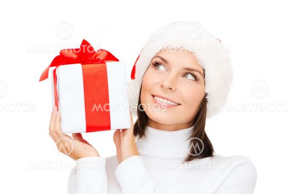 smiling woman in santa helper hat with gift box