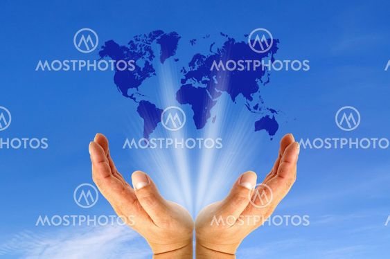 Human hands holding map world