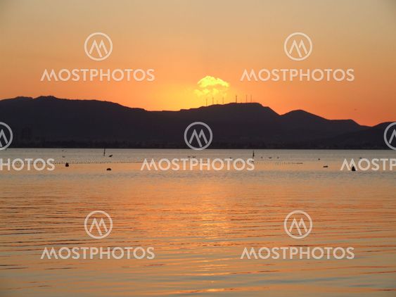 Sunset Over Land And Sea