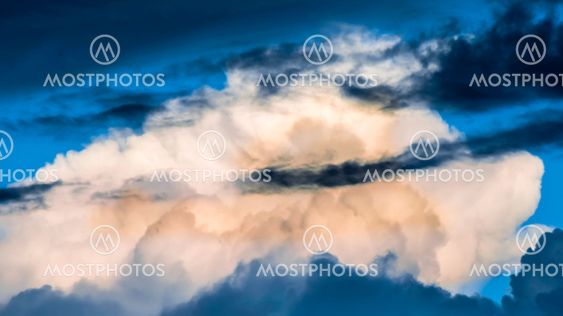 Dramatic clouds and deep blue sky