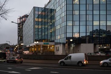 The KVK or Chamber of Commerce at dusk in Amsterdam, The...