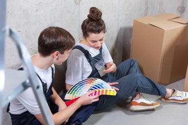 House decoration DIY renovation concept Happy couple...