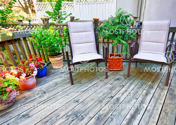 Chairs on wooden deck