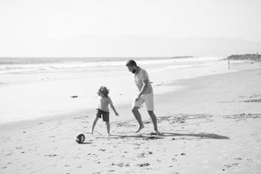 dad and child having fun outdoors. childhood and...