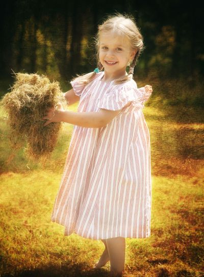 Cute little girl in the garden