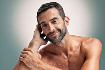 Beauty, smile and skincare with portrait of man in...