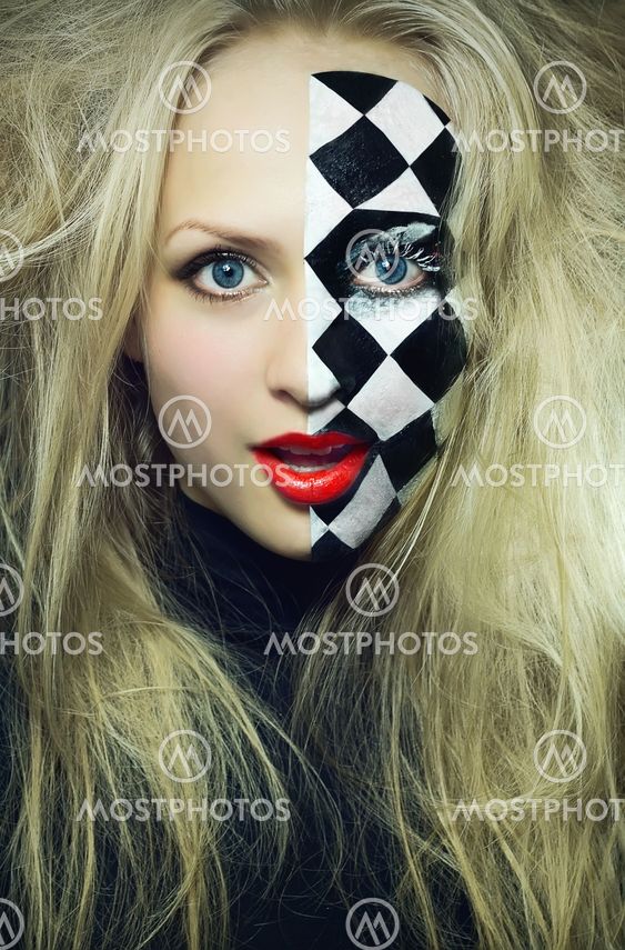 Closeup of model with a chess pattern on her face