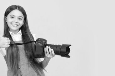 the best. childhood. teen girl taking photo. kid use...