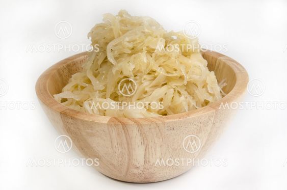 homemade sauerkraut in a wooden bowl