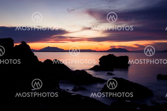Rock silhouettes and vivid sunset