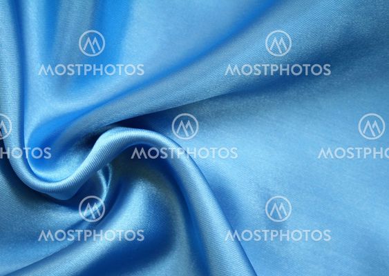 Smooth elegant blue silk as background