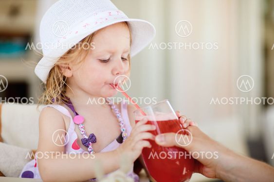 Cute little girl in restaurant
