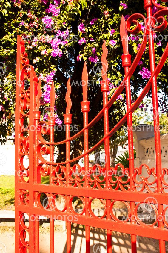 Red iron fence.