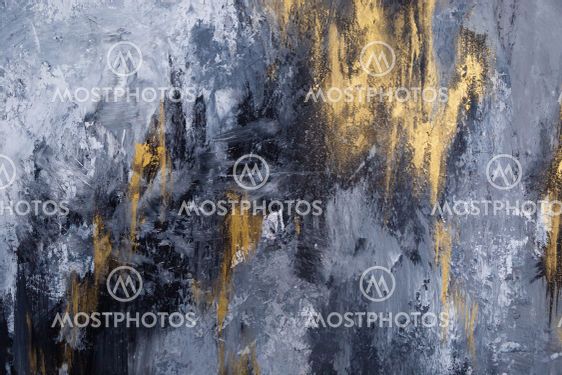 Textured wall with gray and golden colors.