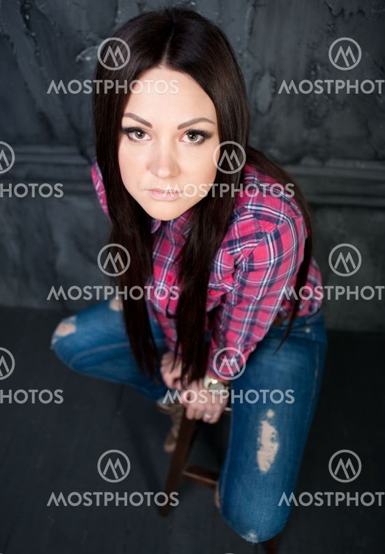 The beautiful young girl poses