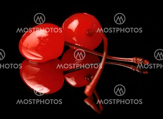 Red cherries on black