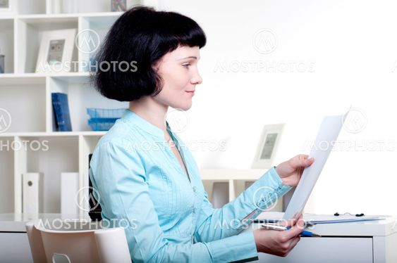 Businesswoman works at office