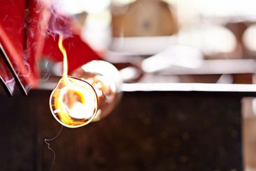 Glass, glowing and heat with professional artisan...