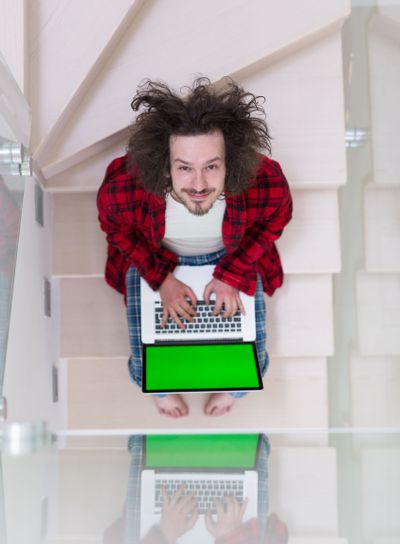 freelancer in bathrobe working from home