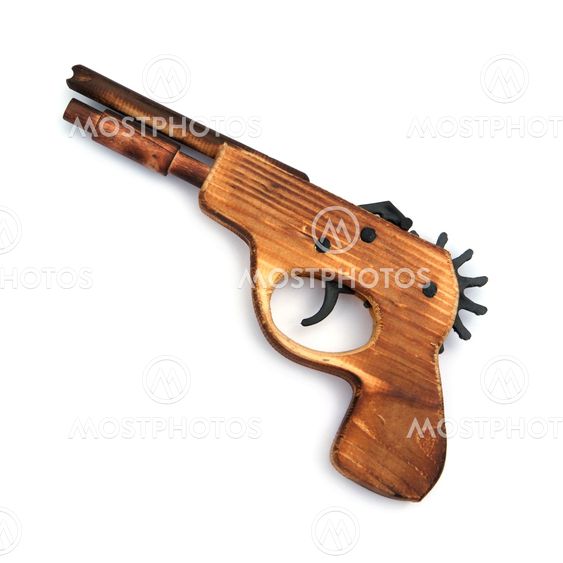 Toy wooden gun , on a white background