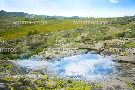 landscape with pool in stone deepening
