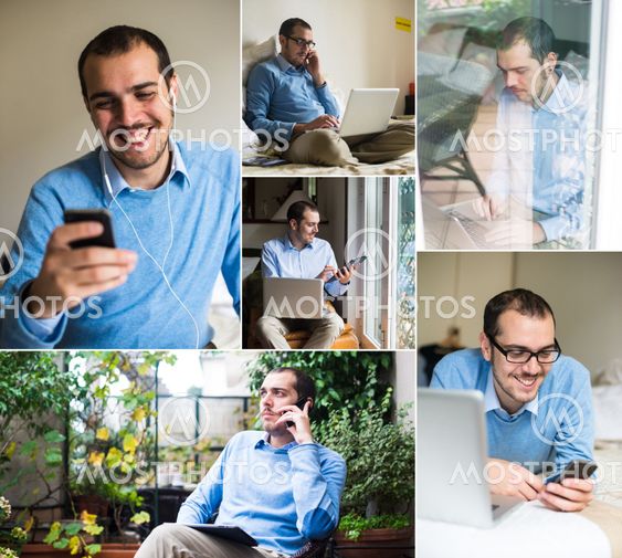 man using technological devices at home