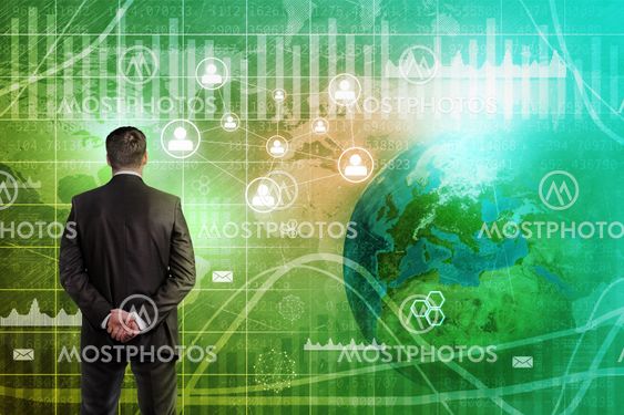 Businessman in front of holographic screen