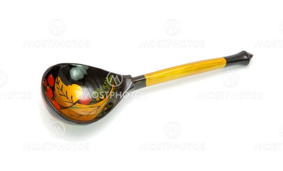 Russian wooden hand-painted spoon on white background