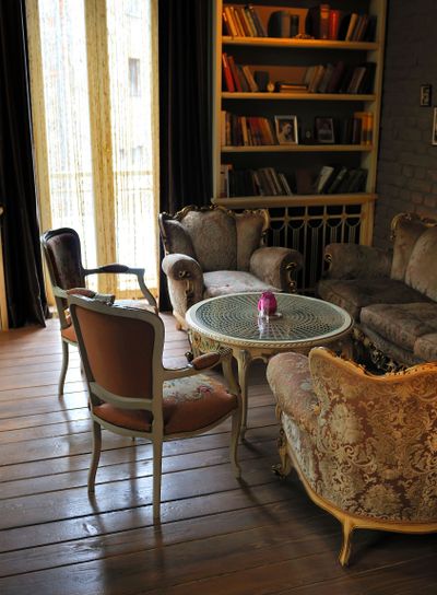 Picture of a retro-style decorated room with relaxed...