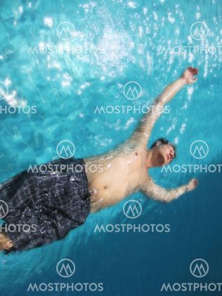 man in swimming pool