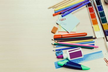 Colorful assortment of stationery and art supplies...