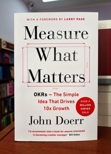 Business concept book 'Measure What Matters' on a...