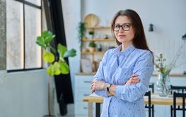 Confident successful mature beautiful woman looking at...