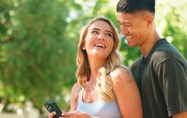 Happy Couple Enjoying Time Together Outdoors With...