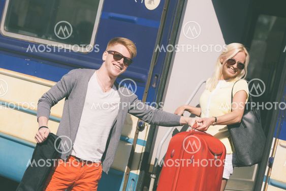 Couple Leaving for Vacation with Train