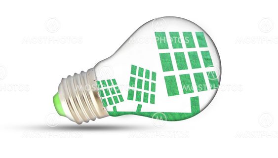 solar cells on green plant inside light bulb