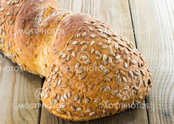 homemade fresh bread on wooden cutting board