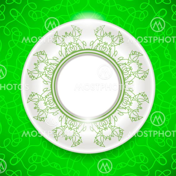 Ceramic Ornamental Plate on Green Background.
